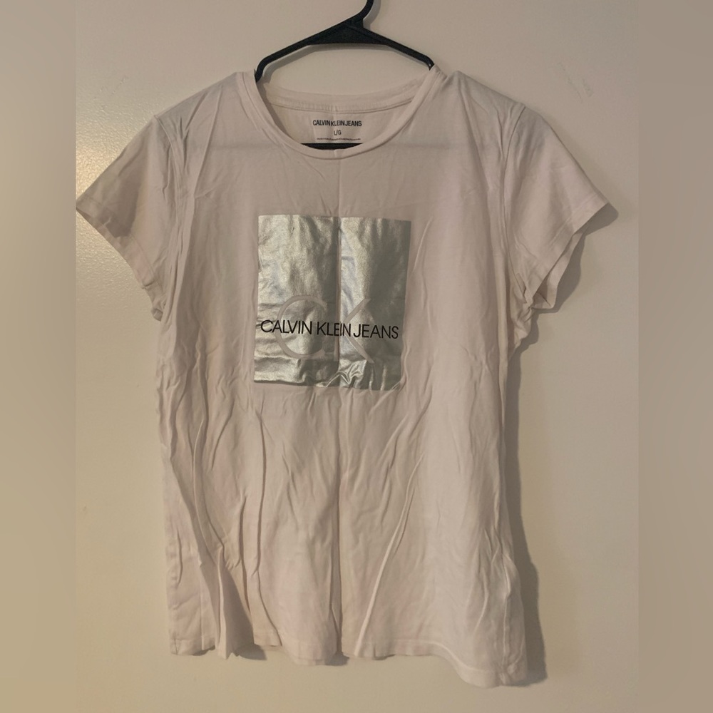 plain white tee with design on front